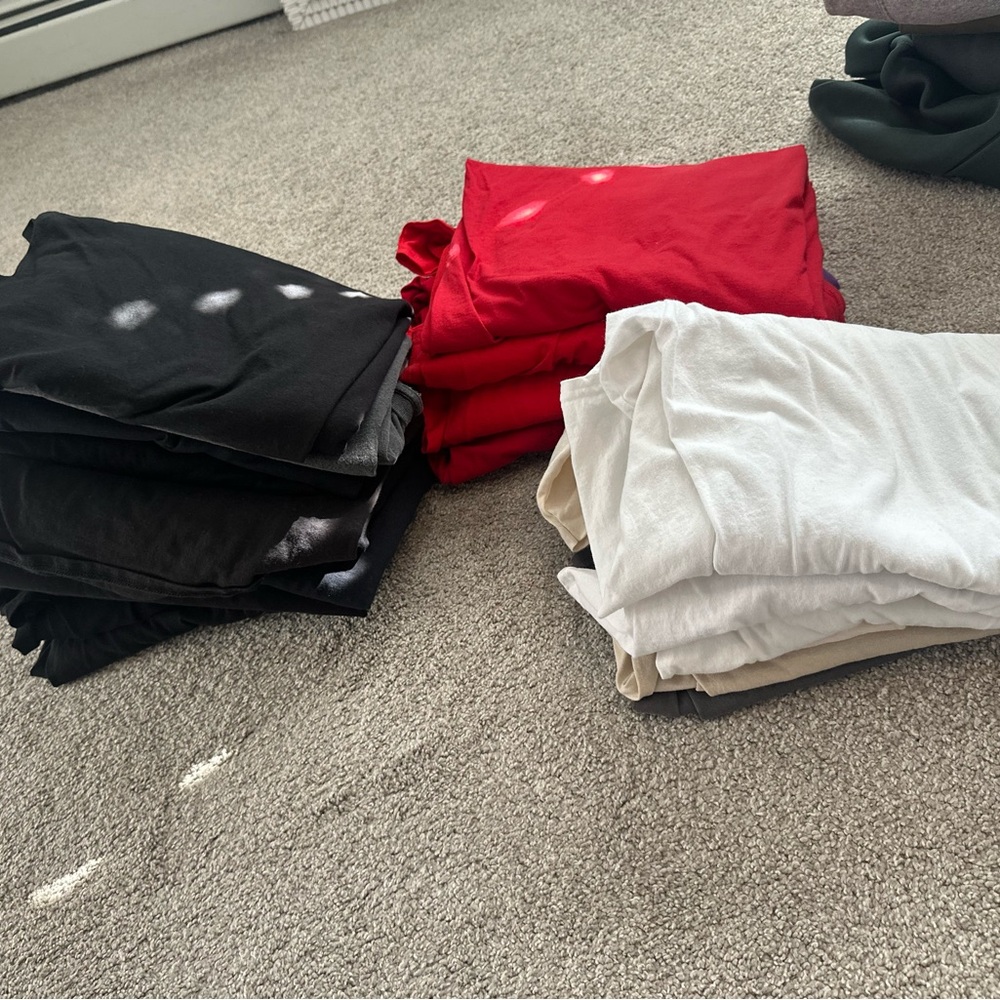 24 shirts for 1 price.  Fashion Nova Short Sleeve Tees - Black, Red, White